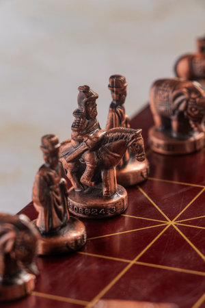 A powerful close-up of the antique copper Chinese Chess Xiangqi General, symbolizing leadership, strategy, and power. Perfect for concepts like business planning, conflict resolution, or cultural games.の写真素材