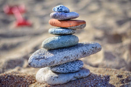 Stones stacked on top of each other on the beach. Stones stacked on top of each other on the beach.