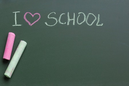 I love school writing on green blackboard pink and green chalkの写真素材