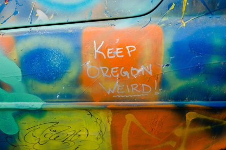 Custom, colorful graffiti paintwork on a Volvo car with words Keep Oregon Weirdのeditorial素材