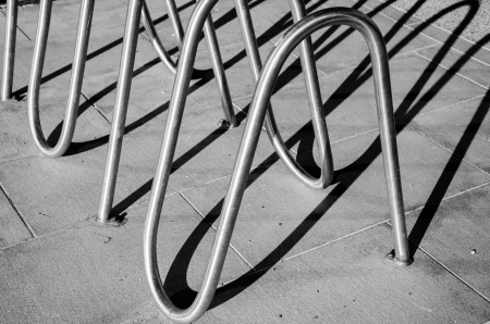 Abstract image of bike rack and shadow in black and white taken in Phoenix, Arizonaの写真素材
