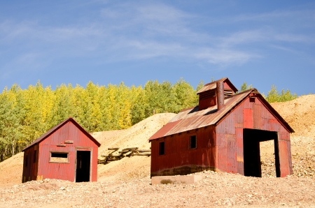 Remnants of old structures at a gold mine near Cripple Creek, Colorado get weathered and rusted by the elements のeditorial素材