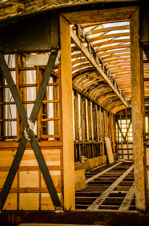 Image of of vintage wooden trolley being restored at the Pikes Peak Trolley Museum in Colorado Springs, Colorado.の写真素材