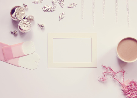 Pink and silver styled Christmas background with copy space.の写真素材