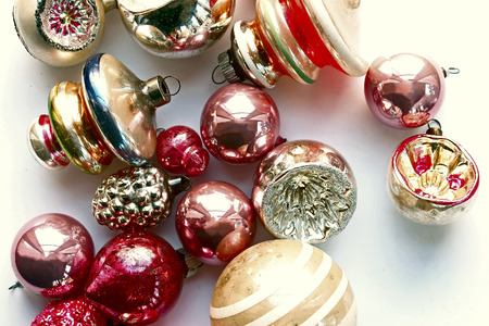 Vintage pink and pastel colored vintage ornaments above view.の写真素材