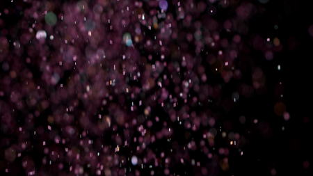 With the use of Realistic Glitter Exploding on Black Background. These clips are perfect for visual effects, compositing, and motion graphics. Use blending mode (screen).の写真素材