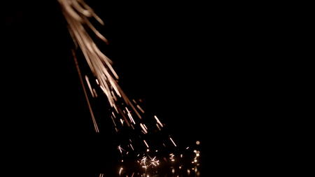 The Metal Sparks has metal sparks flying in the air over a black background. Drop it in and change...
