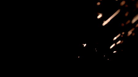 The Metal Sparks has metal sparks flying in the air over a black background. Drop it in and change its blending mode to remove the black background.の写真素材