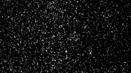 Snowfall Bokeh Lights on Black Background, Shot of Flying Snowflakes in the Airの写真素材