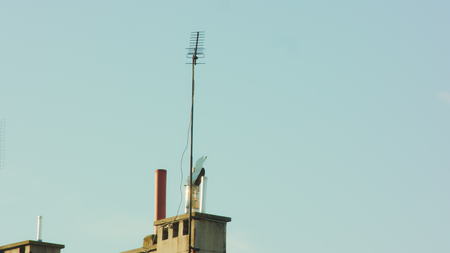 Modern chimney on the roof of house vent pipeの写真素材