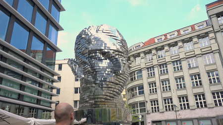 Prague, Czech Republic - May 2017: Statue Metalmorphosis by Czech sculptor David Cerny. Long shotのeditorial素材