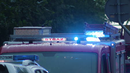 Lublin, poland - July 2017: Fire truck prepared to rescue. City scene. Medium shot. Soft focus