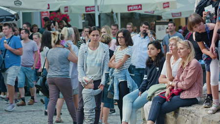 Lublin, Poland - July 2017: Kids, teens and adults are laughing and watching Mattatoio Sospesos...