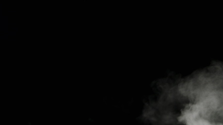 Isolated fog or smoke move on black color backgroundの写真素材