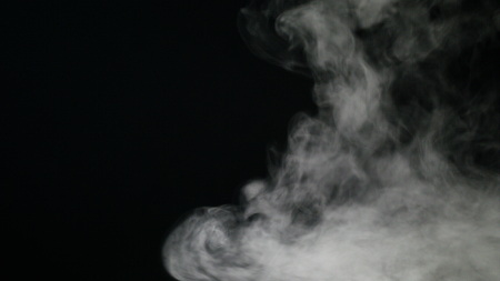 Isolated fog or smoke move on black color backgroundの写真素材