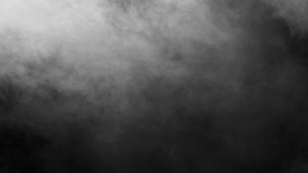 White clouds of vapor smoke are isolated on a black background. Gas explodes, swirl and dances in space. A magic fog dust texture effect that can be used by overlay and changing their transparency.の写真素材