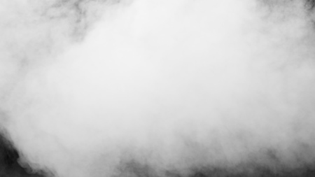 White clouds of vapor smoke are isolated on a black background. Gas explodes, swirl and dances in space. A magic fog dust texture effect that can be used by overlay and changing their transparency.の写真素材