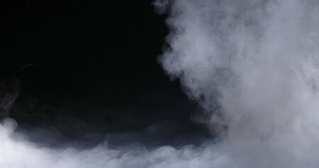 Realistic dry ice smoke clouds fog overlay perfect for compositing into your shots. Simply drop it in and change its blending mode to screen or add.の写真素材