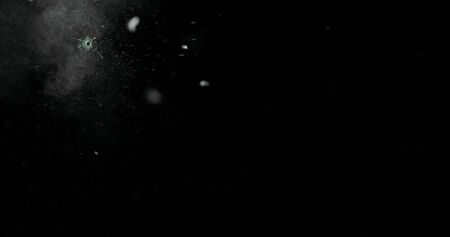 Real frost on a window. Frostwork pattern ice crystals on black background. Dark surface with abstract ice structure makes to overlay or add a frost effect.の写真素材