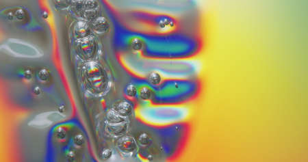 Bubbles On Melting Plastic. Bubbles forming across a melting plastic surface.