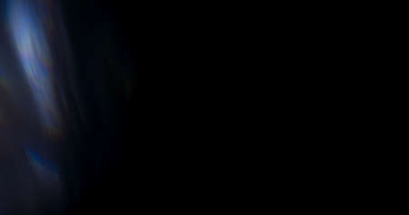 Prism Rainbow Light Flares Overlay on Black Backgroundの写真素材