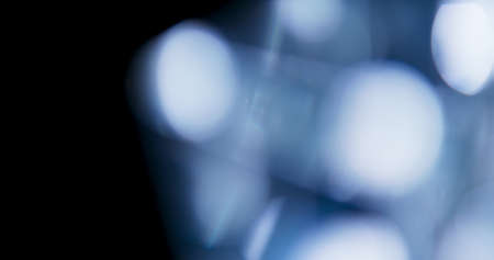 Shinning Light Flares Prism Rainbow Light Flares Overlay on Black Backgroundの写真素材