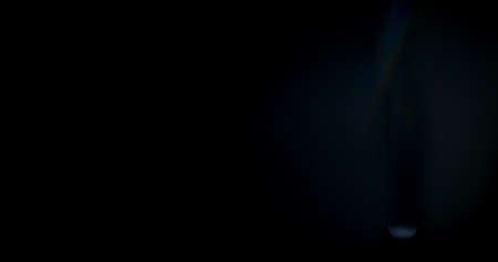 Prism Rainbow Light Flares Overlay on Black Backgroundの写真素材