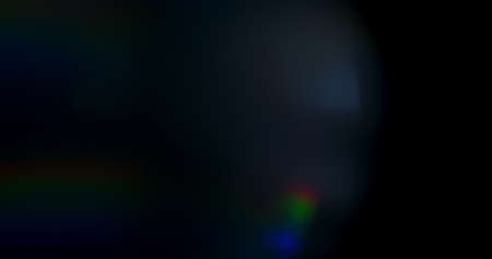 Prism Rainbow Light Flares Overlay on Black Backgroundの写真素材