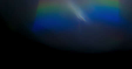 Prism Rainbow Light Flares Overlay on Black Backgroundの写真素材
