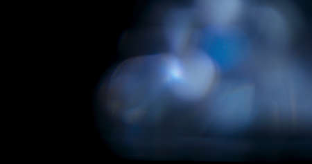 Prism Rainbow Light Flares Overlay on Black Backgroundの写真素材