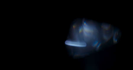 Prism Rainbow Light Flares Overlay on Black Backgroundの写真素材