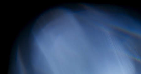 Prism Rainbow Light Flares Overlay on Black Backgroundの写真素材