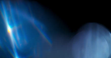 Blue Light Flare Prism Rainbow Light Flares Overlay on Black Backgroundの写真素材