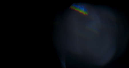 Blue Prism Light Flare Overlay Prism Rainbow Light Flares Overlay on Black Backgroundの写真素材