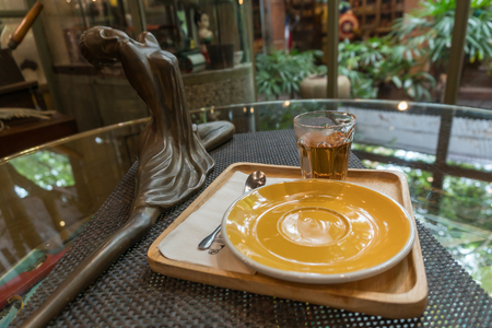 coffee cup in coffee shop ans tee Put on the wooden brownの写真素材
