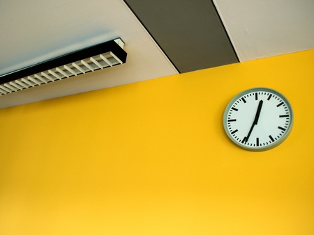 Clock on yellow wall