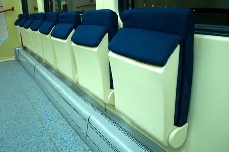 Red blue comfortable seats on the train, photographed in Novi Sad, Serbia