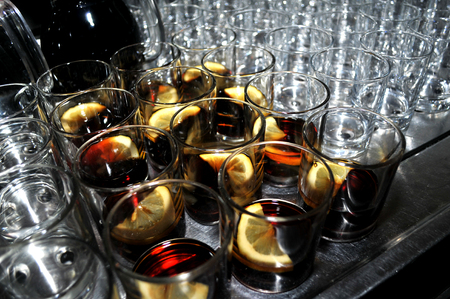 Beautiful glasses with a slice of lemon and bitters, Novi Sad, Serbiaの写真素材