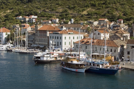 Town Vis on island Vis in Croatia, view on boats in harbourの写真素材