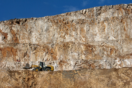 Bulldozer working in a rock quarry near Split in Croatiaの写真素材