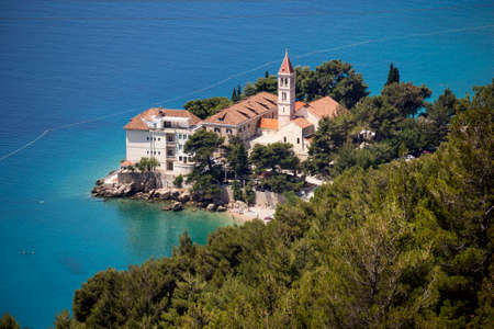 Famous Dominican Monastery in tourist village Bol on south side of Brac island in Croatiaの写真素材