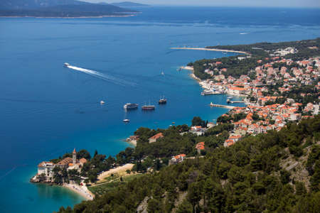 Touristic village Bol on south side of Brac island in Croatia with its famous beach Golden cape (Zlatni Rat)の写真素材