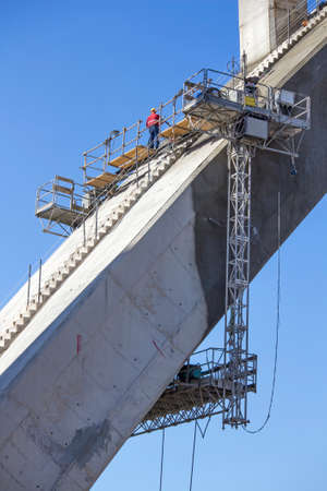 Renewing corrosion damages on arch and pillars of concrete bridge Maslenica on A1 highway in Croatiaの写真素材