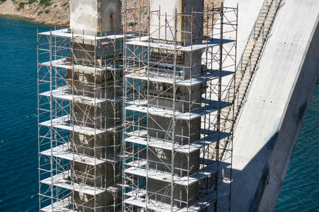 Renewing corrosion damages on arch and pillars of concrete bridge Maslenica on A1 highway in Croatia