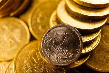 Russian money toned in gold isolated on whiteの写真素材