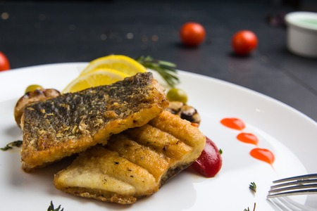 Homemade fries on a table with ingredients and cutlery around. Concept: healthy food, diet, fastfood.の写真素材