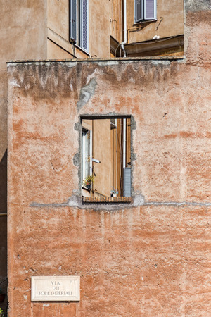 The city through the window - Street of Imperial Fora - Rome (Italy)の写真素材