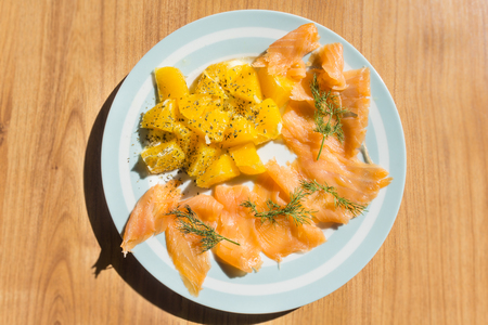 Salmon with orange saladの写真素材