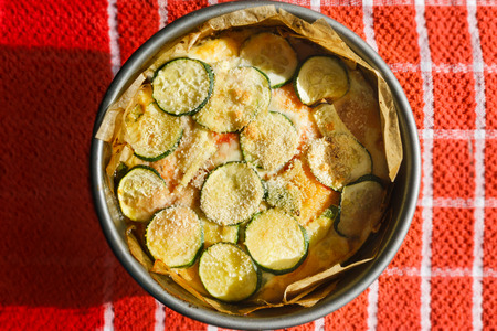 Zucchini Lasagna - on a red clothの写真素材