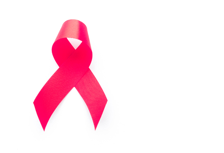 Red ribbon on white background ,Awareness breast cancer conceptの写真素材